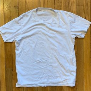 Plain white Uniqlo tee in men’s medium